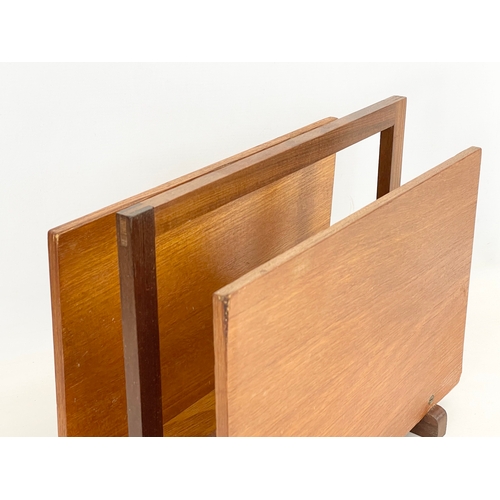 260U - A Mid Century teak magazine rack. 37x17.5x30.5cm