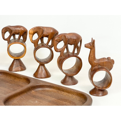 260V - A quantity of Mid Century teak. Including a tray 30.5cm, 4 napkin rings and a lighter.