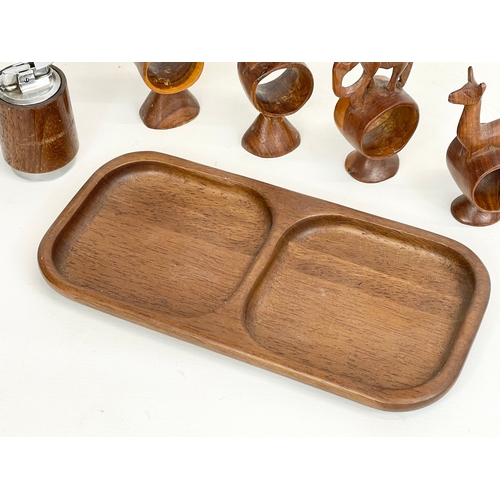 260V - A quantity of Mid Century teak. Including a tray 30.5cm, 4 napkin rings and a lighter.