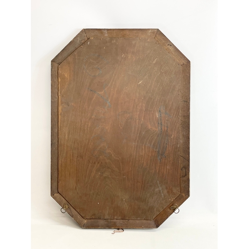 290A - A 1920’s oak framed mirror. 48x68cm