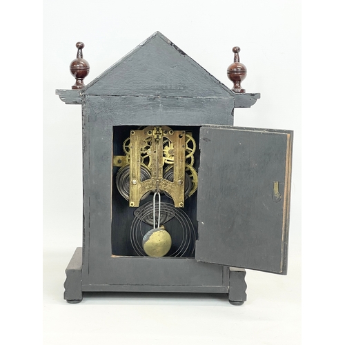 270C - A late 19th century American oak vases mantle clock, by Ansonia. With pendulum. 26x14x39cm