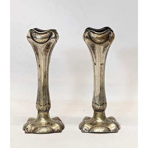 484 - A pair of early 20th century Art Nouveau silver plated vases. 16cm