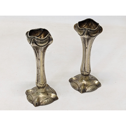 484 - A pair of early 20th century Art Nouveau silver plated vases. 16cm