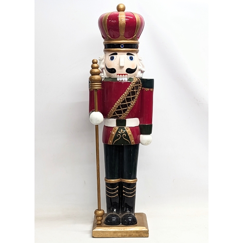 740 - A large nutcracker ornament. 92cm