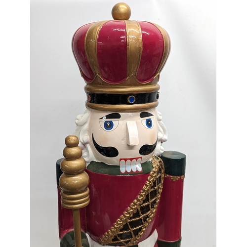 740 - A large nutcracker ornament. 92cm