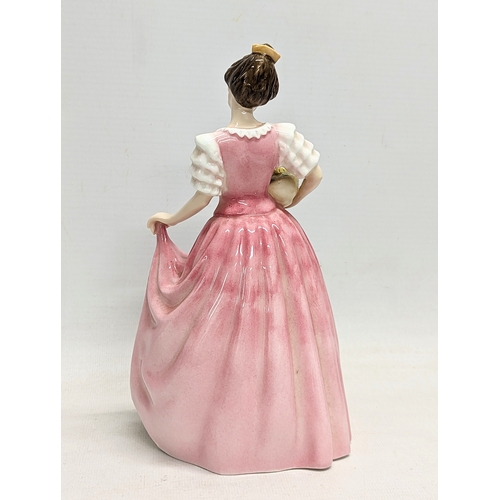 744 - A Royal Doulton pottery figurine, 