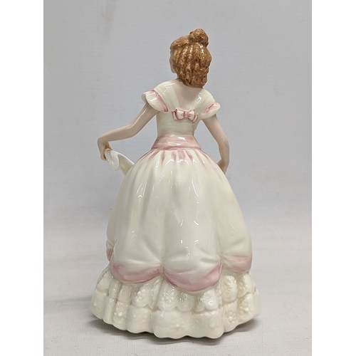 745 - A Royal Doulton pottery figurine, 