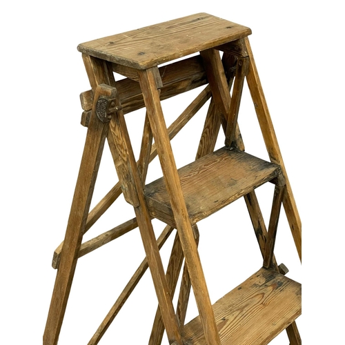 350 - An early 20th century lattice step ladder by The Hatherley. 148cm folded.