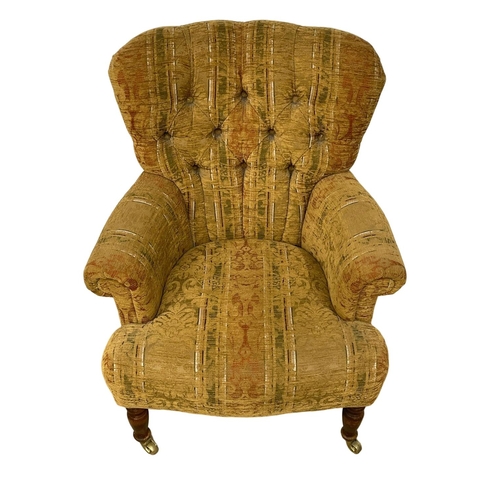 362 - A deep button back armchair. 72x56x83cm