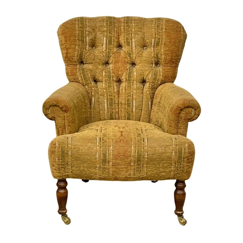 362 - A deep button back armchair. 72x56x83cm