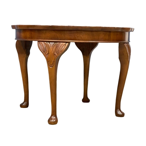 369 - A 1930’s Walnut occasional table on Queen Anne legs. 60x43cm