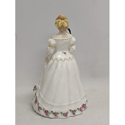 761 - A Royal Doulton pottery figurine, 