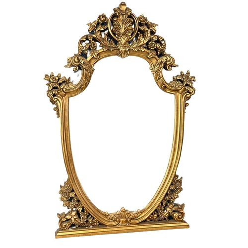 92 - A large ornate 18th century style mirror in the Rococo style. 75.5x124cm