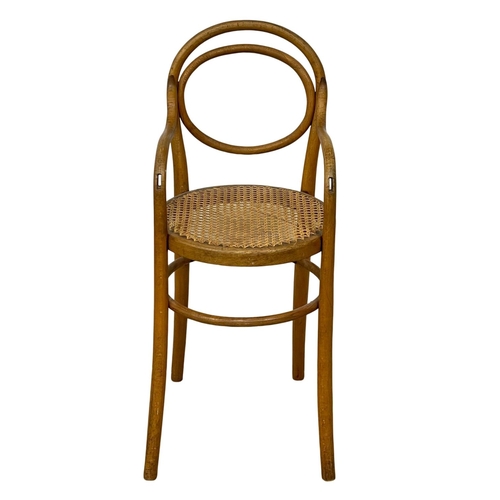 93 - A vintage child’s Bentwood chair with bergere seat.