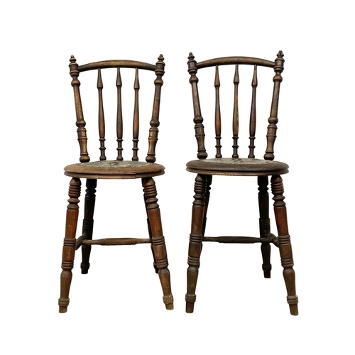 94 - A pair of Victorian Stick Back kitchen chairs. Circa 1890.