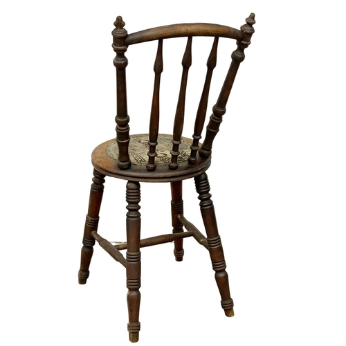 94 - A pair of Victorian Stick Back kitchen chairs. Circa 1890.