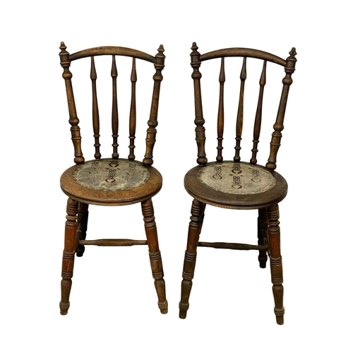 94 - A pair of Victorian Stick Back kitchen chairs. Circa 1890.