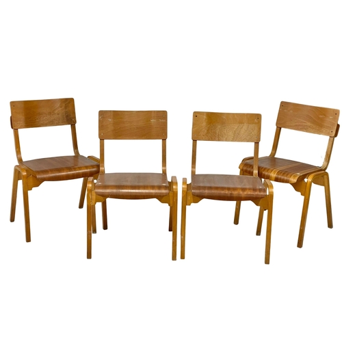 A set of 4 vintage stacking chairs by Tecta. Designed by