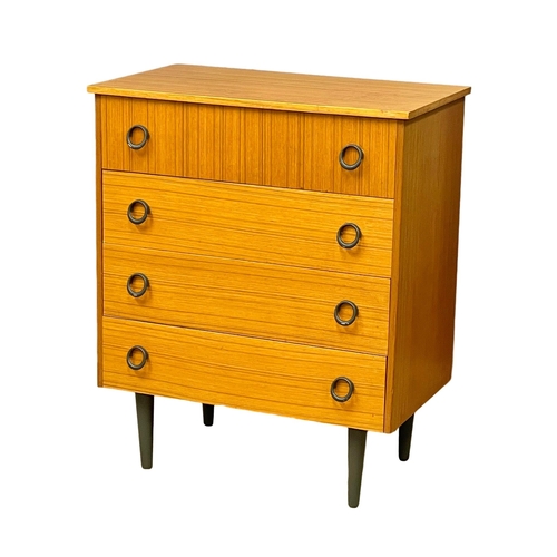 122E - A Mid Century teak chest of drawers. 74x43.5x89cm