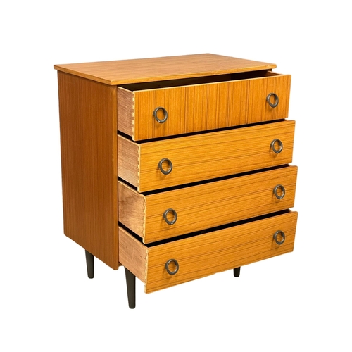 122E - A Mid Century teak chest of drawers. 74x43.5x89cm