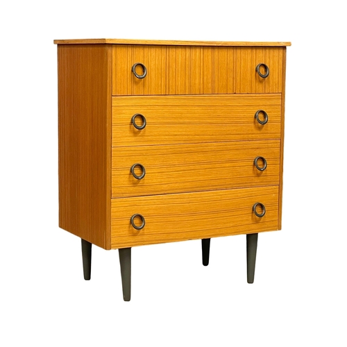 122E - A Mid Century teak chest of drawers. 74x43.5x89cm