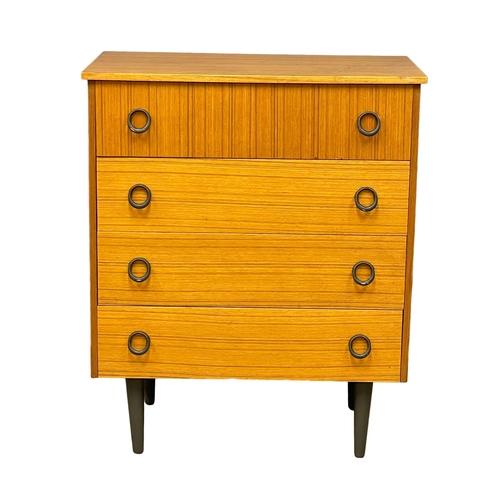 122E - A Mid Century teak chest of drawers. 74x43.5x89cm