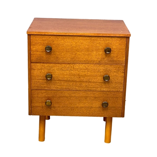 122F - A Mid Century teak chest of drawers. 57.5x42.5x70cm