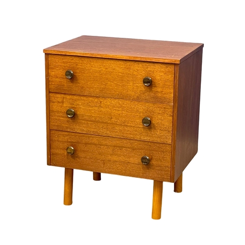 122F - A Mid Century teak chest of drawers. 57.5x42.5x70cm