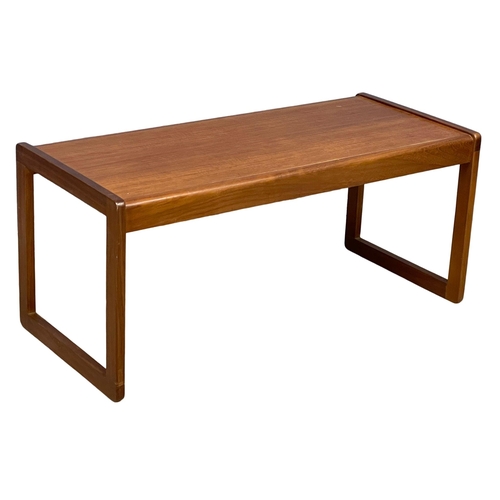 122G - A Mid Century teak coffee table. 96x43x41cm