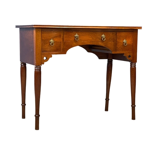 122P - A vintage mahogany writing desk. 91x46x76cm