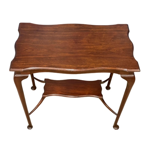 122Q - An Edwardian mahogany window table. 76x46x72cm