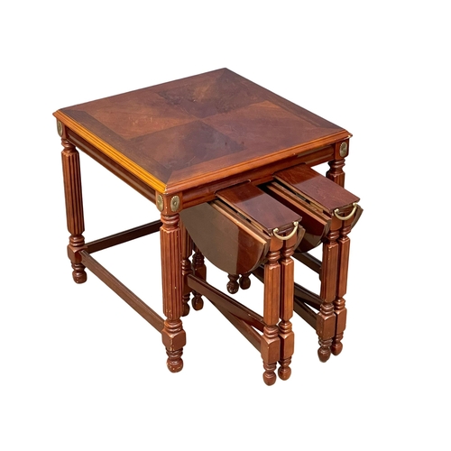 122Y - A mahogany nest of tables. 56x56x53cm