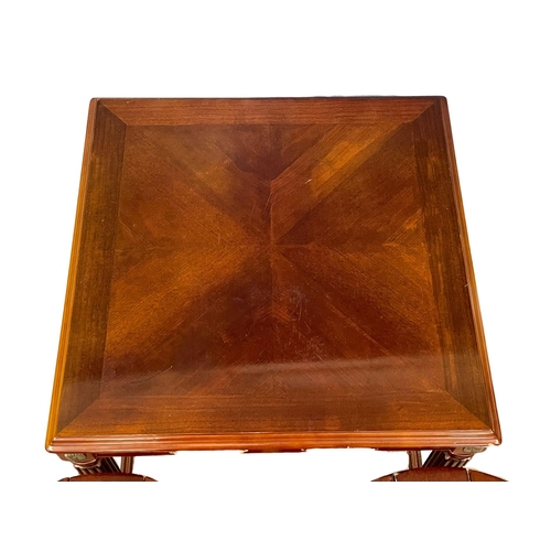 122Y - A mahogany nest of tables. 56x56x53cm