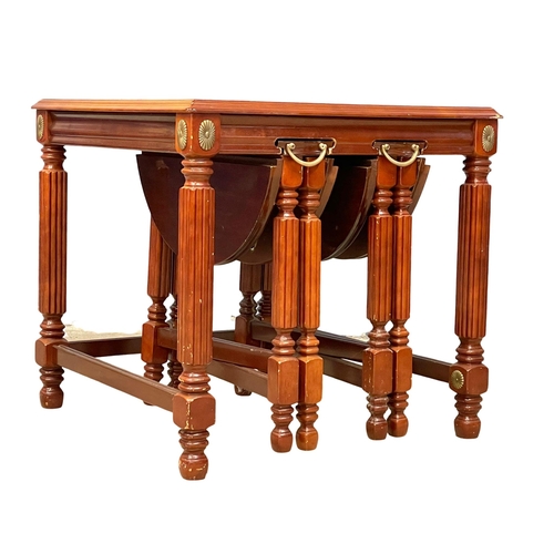 122Y - A mahogany nest of tables. 56x56x53cm