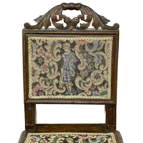 270L - An early 20th century carved oak side chair in the Jacobean style.