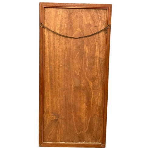 270V - A Mid Century teak and brass framed mirror. 36x75cm