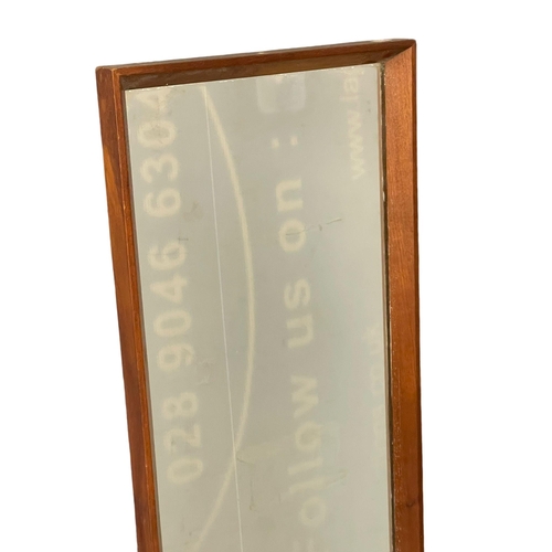 270W - A long Mid Century teak framed mirror by Rowley Design. 33x124cm