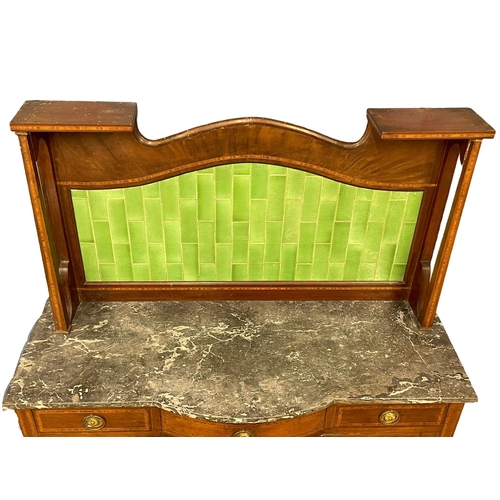 270D - An Edwardian inlaid mahogany marble top washstand with tiled gallery. 125x48x144cm