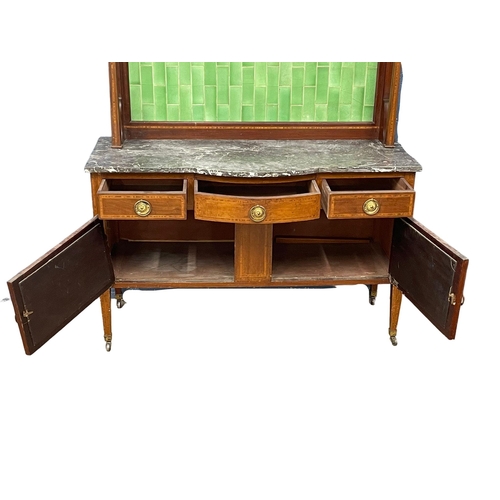 270D - An Edwardian inlaid mahogany marble top washstand with tiled gallery. 125x48x144cm