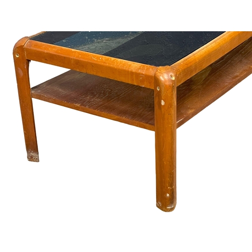 270F - A Nathan Mid Century teak 2 tier coffee table with smoked glass top. 107x49x36cm