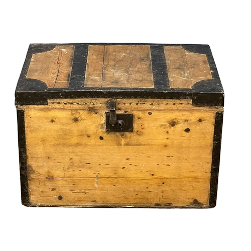 281G - A Victorian pine metal bound trunk from Roger Farrell, Dublin. 69x45x45cm