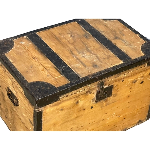 281G - A Victorian pine metal bound trunk from Roger Farrell, Dublin. 69x45x45cm