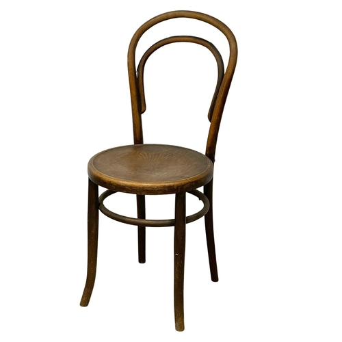 374C - An early 20th century Bentwood chair by Fischell with Pokerwork seat