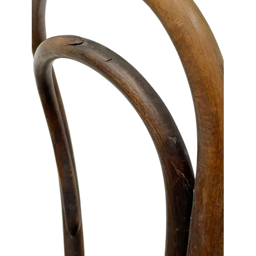 374C - An early 20th century Bentwood chair by Fischell with Pokerwork seat