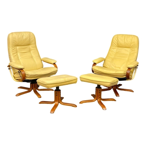 374D - A pair of leather armchairs with matching stools.