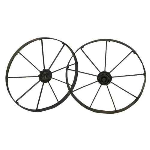 61 - A pair of large 19th century steel wagon wheels. 112cm