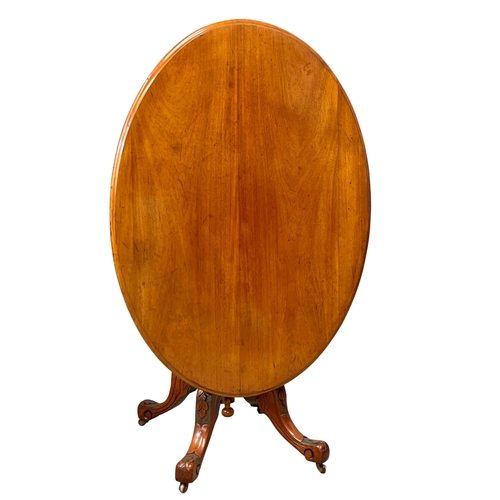 954 - A Victorian mahogany tilt top breakfast table. Circa 1870. 118x86x72.5cm