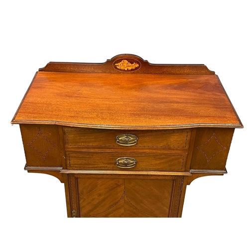 956 - A late Edwardian inlaid mahogany side cabinet. 88x44x116