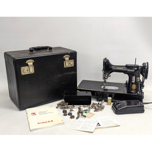 56 - A rare Singer Featherweight sewing machine 222K. Serial number EJ618431, allocated 31 March 1954.