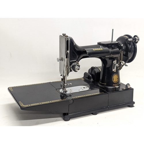 56 - A rare Singer Featherweight sewing machine 222K. Serial number EJ618431, allocated 31 March 1954.